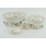 Wedgwoo Wild Strawberry to include a large oval tureen, a circular tureen, a mantle clock and a