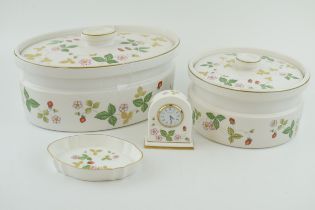 Wedgwoo Wild Strawberry to include a large oval tureen, a circular tureen, a mantle clock and a