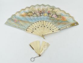 An antique bone fan work with inset mirror to top right, together with another miniature bone fan