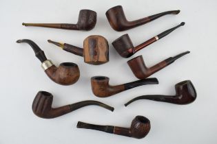 A collection of vintage tobacco smoking pipes to include briar and similar examples by 'K & P