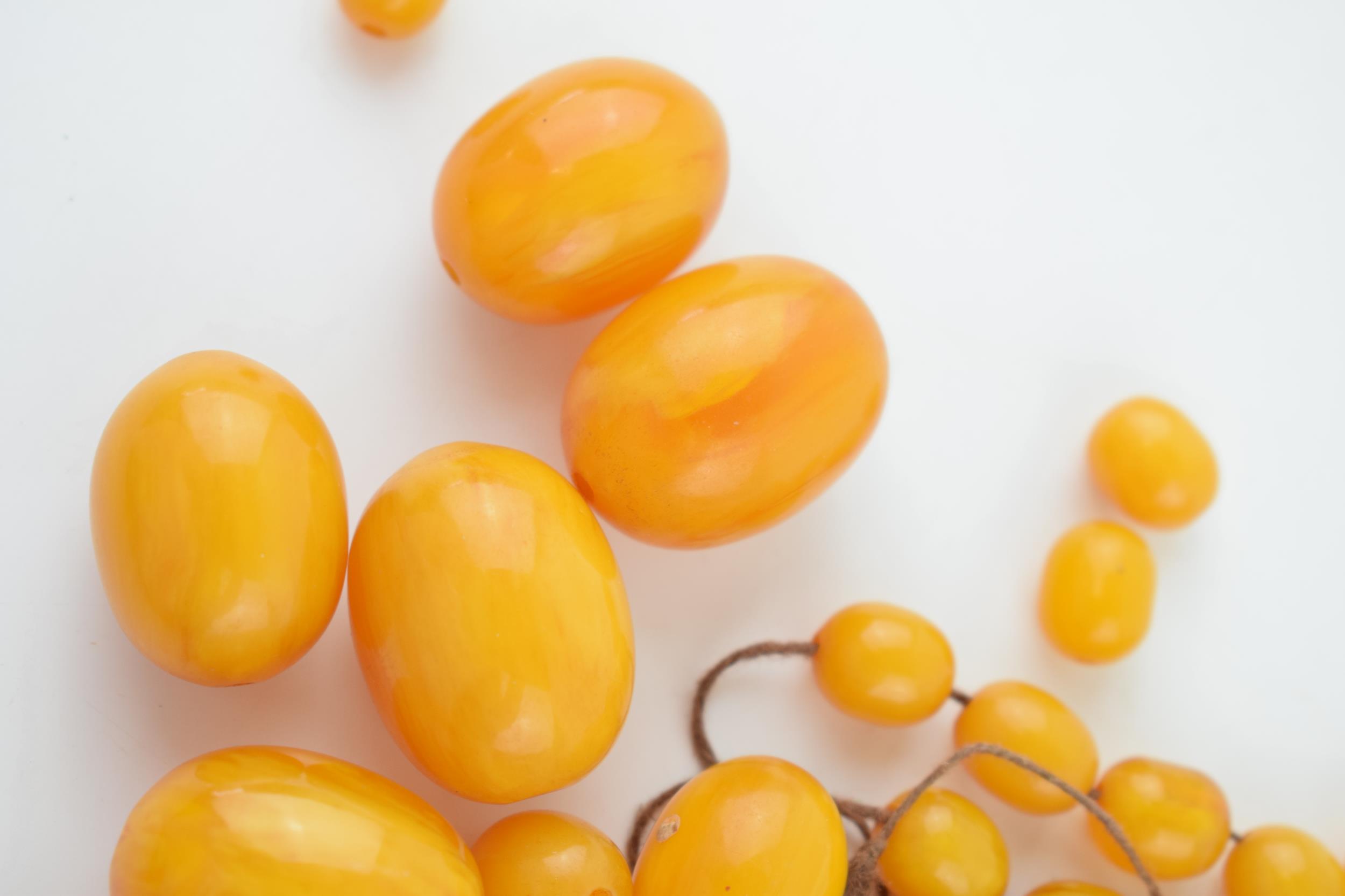 Butterscotch amber similar graduated necklace beads. Weight 84 grams. beads good but a/f have become - Image 3 of 11