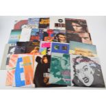 A collection of vinyl 45 singles from the 1980s and 1990s to include artists, The Damned, The Wonder