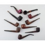 A collection of vintage tobacco smoking pipes to include briar and similar examples by 'St