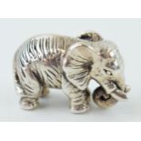 Silver figure of an elephant, 4cm long, 13.8 grams, stamped sterling.