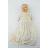 Bisque head doll with sprayed head and moving eyes. AM made in Germany. Height 36cm. Generally