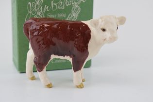 Boxed Beswick Hereford calf. In good condition with no obvious damage or restoration.