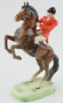 Beswick Rearing Huntsman on Brown Horse 868. In good condition with no obvious damage or