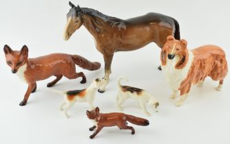 Beswick to include a large standing fox, two foxhounds, a small standing fox, a rough collie and a