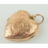 A 9ct yellow gold heart shaped locket / pendant. Height 2.3 grams. Weight 3.7 grams.