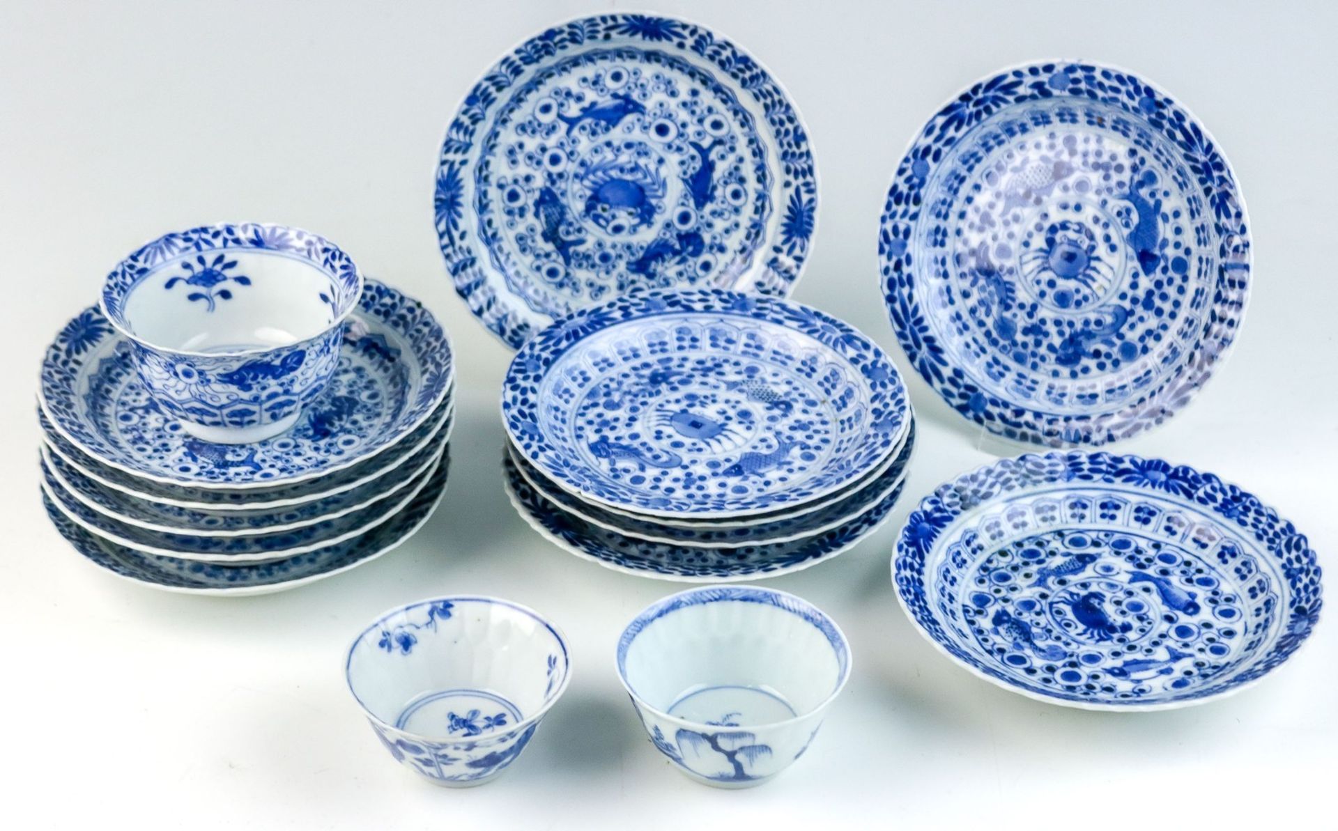 12 kleine Teller mit unterglasurblauer Malerei China