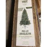 Pre- lit Douglas fir - PVC tree with 240 multi- action warm white LEDs.