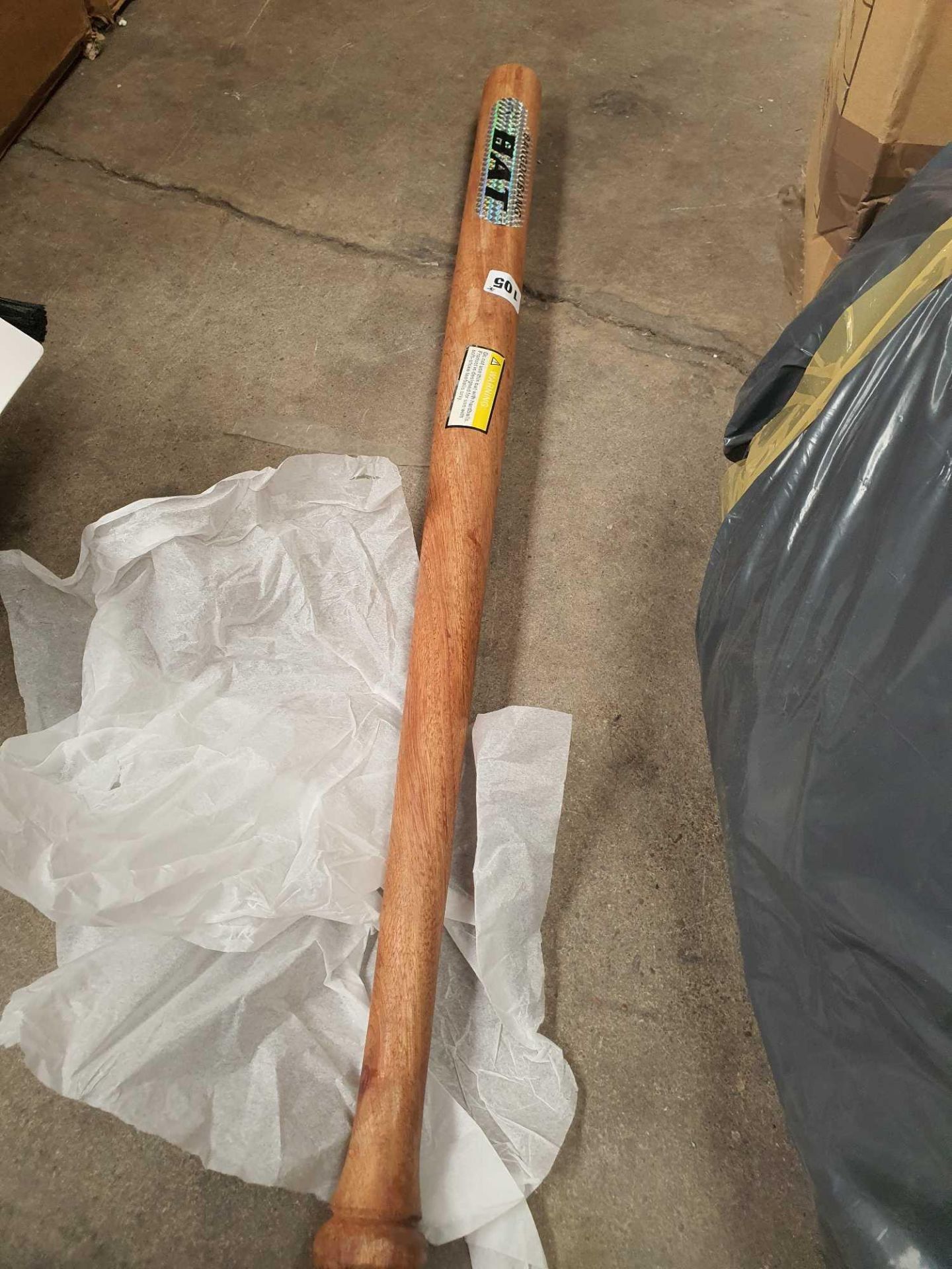 Wooden baseball bat.