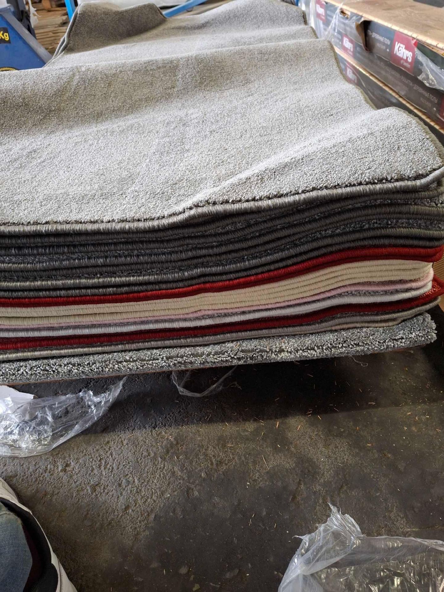 1 Pallet consisting of 20 rugs.8 dark grey, 3 red 4 cream 1 pink 2 silver 1 light grey 1 light brown