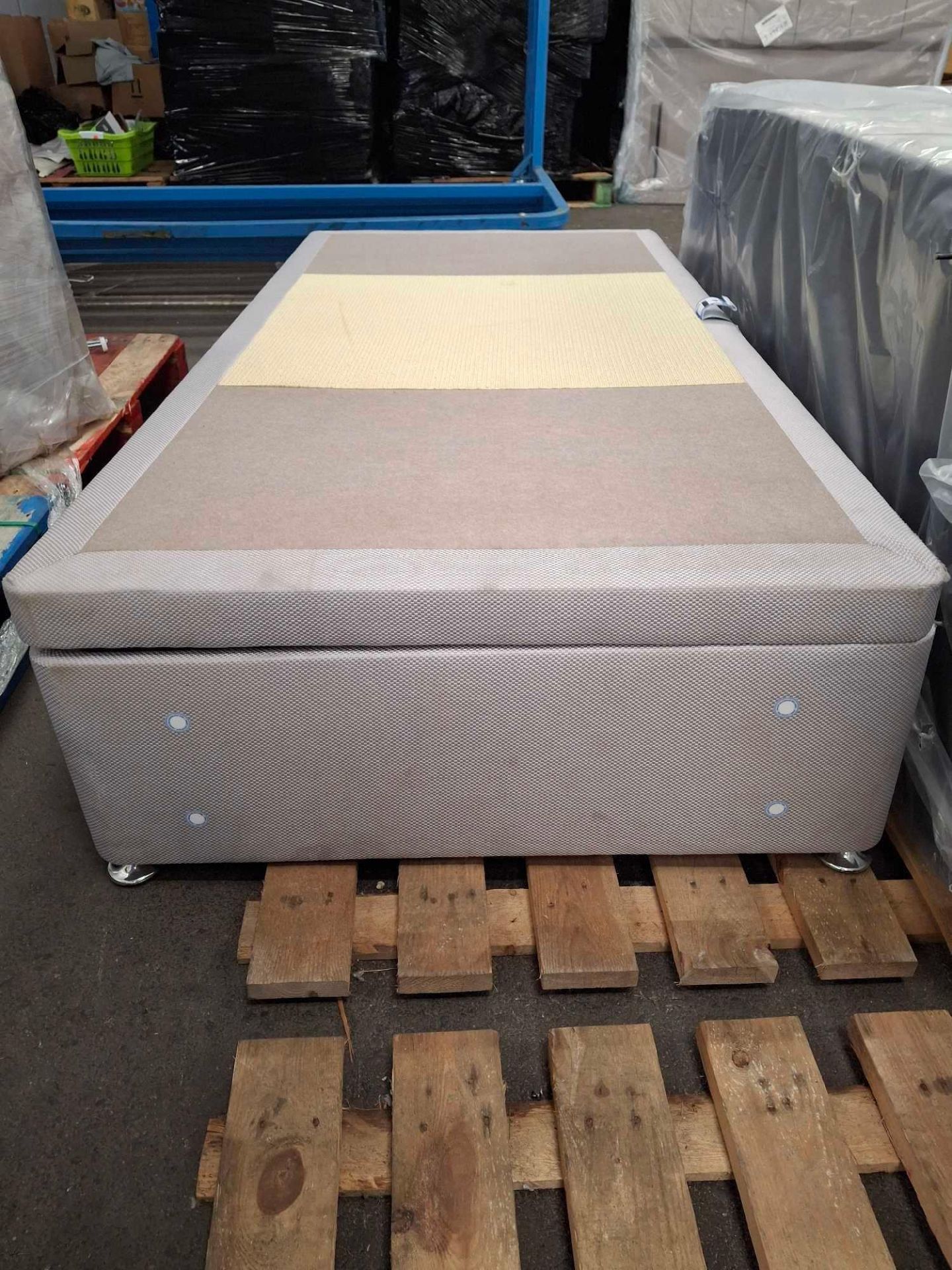 1 single ottoman bed Base side opening silver/grey colour bottom is damaged and there is a few scuff