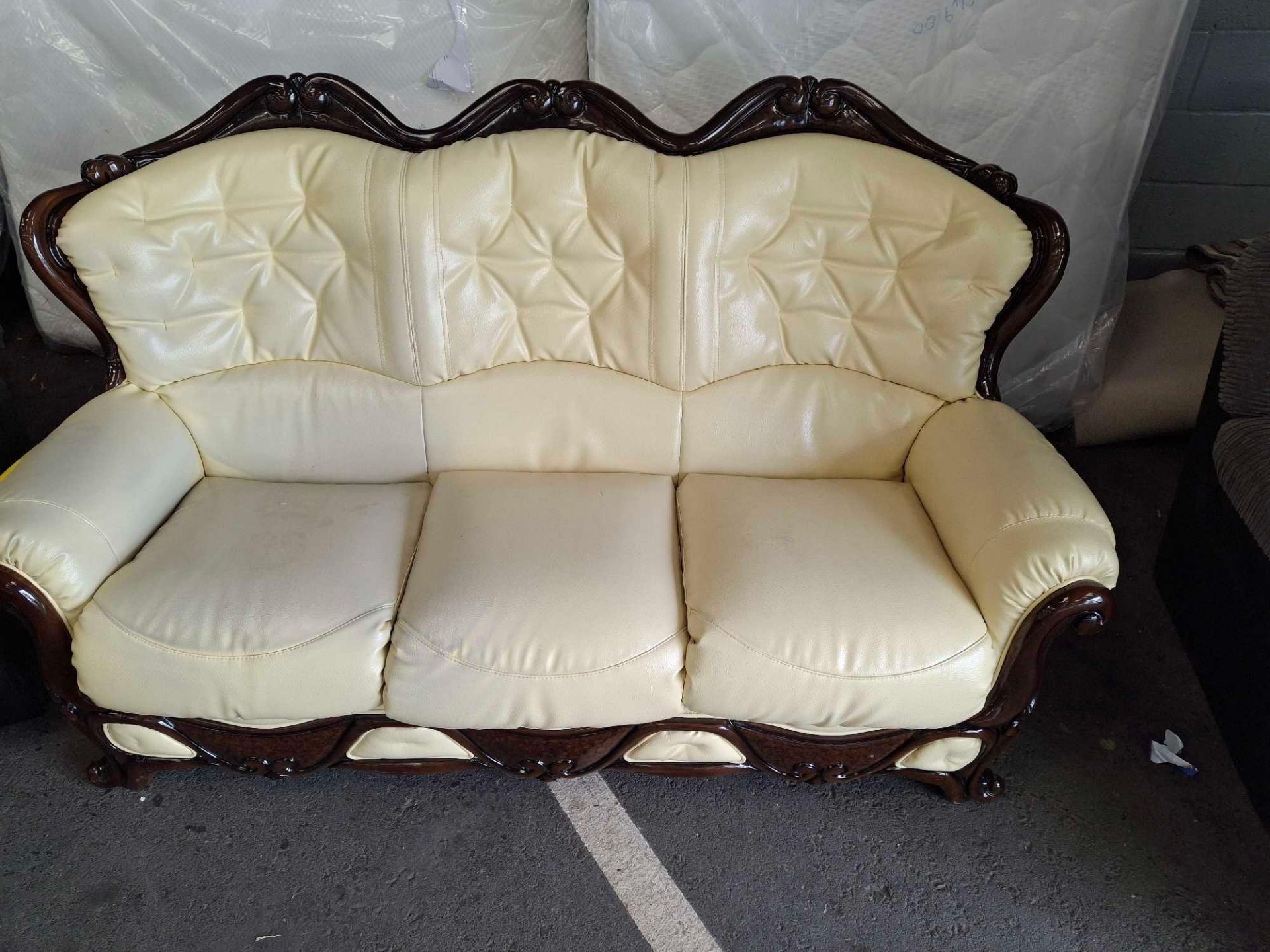 Cream Dodgson Faux Leather Sofa discoloured in places