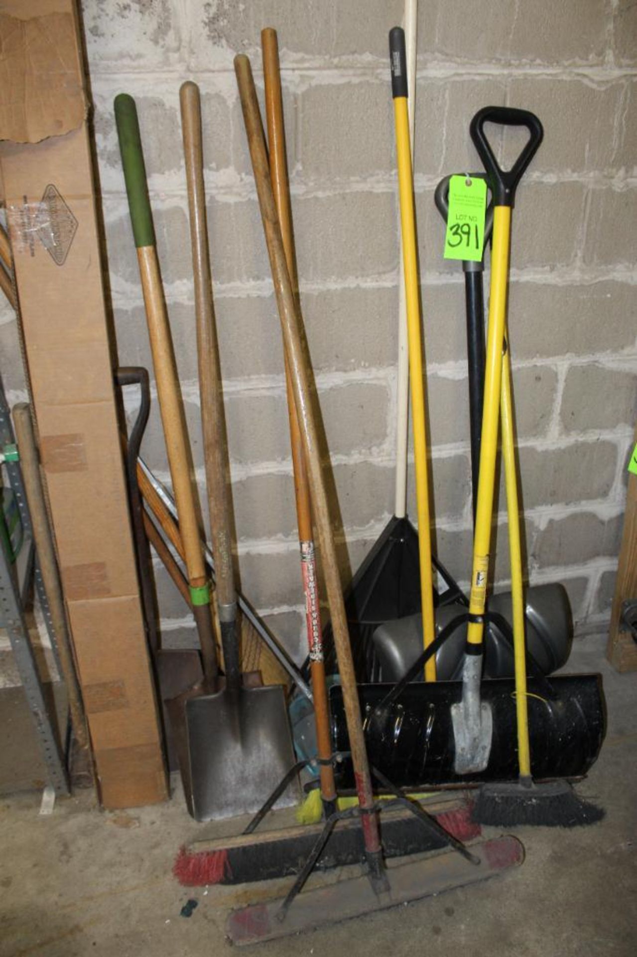 Lot of Brooms and Shovels