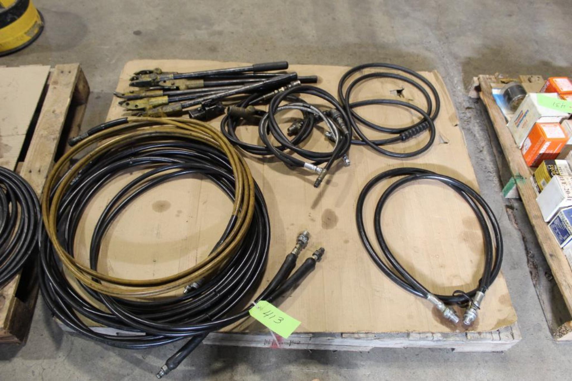 Lot of (6) Assorted Hoses and (6) Handles For Hydraulic Pumps