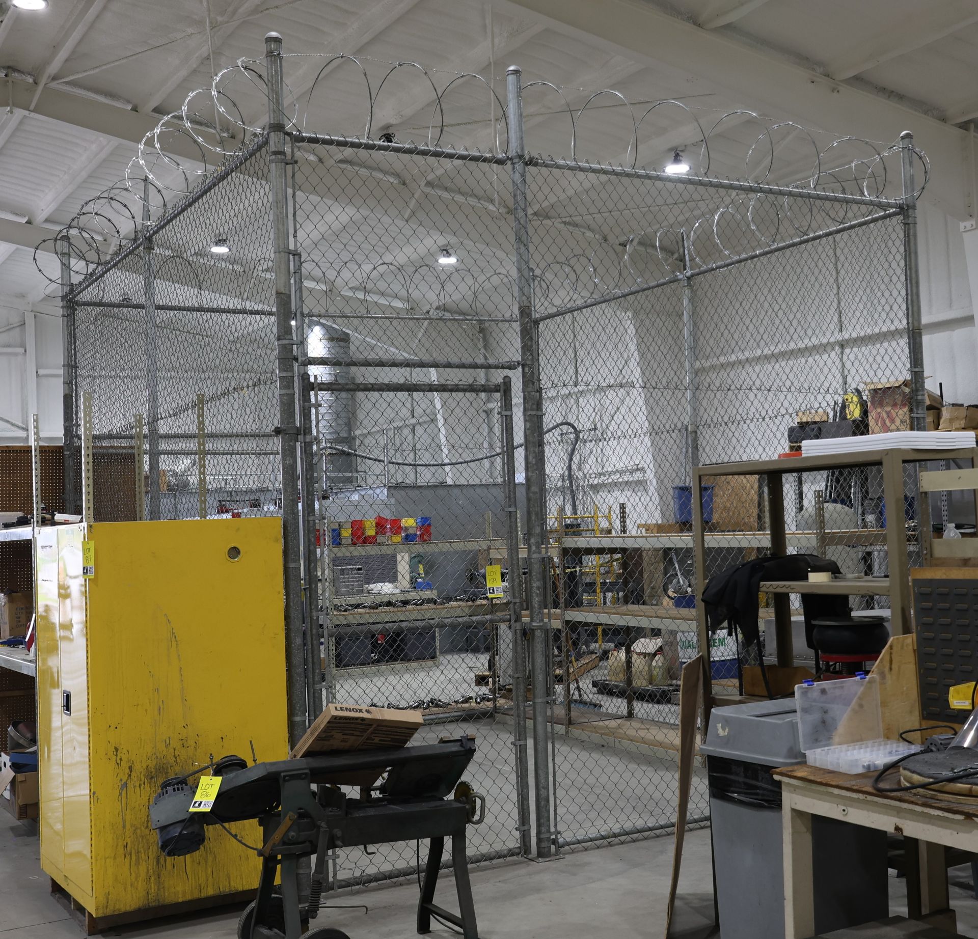 Cage Topped with Razor Wire & Shelves