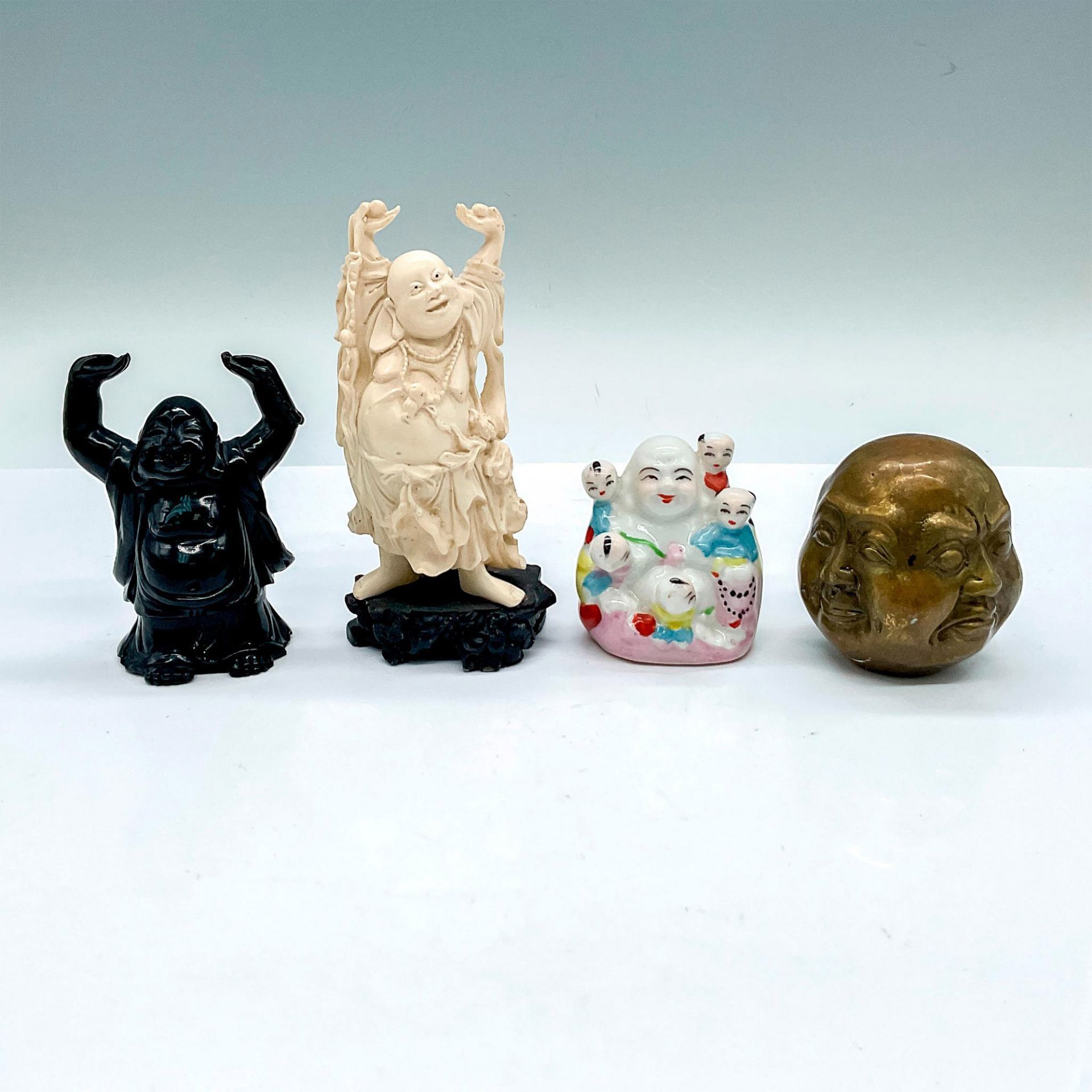 4pc Asian Buddha Figurines