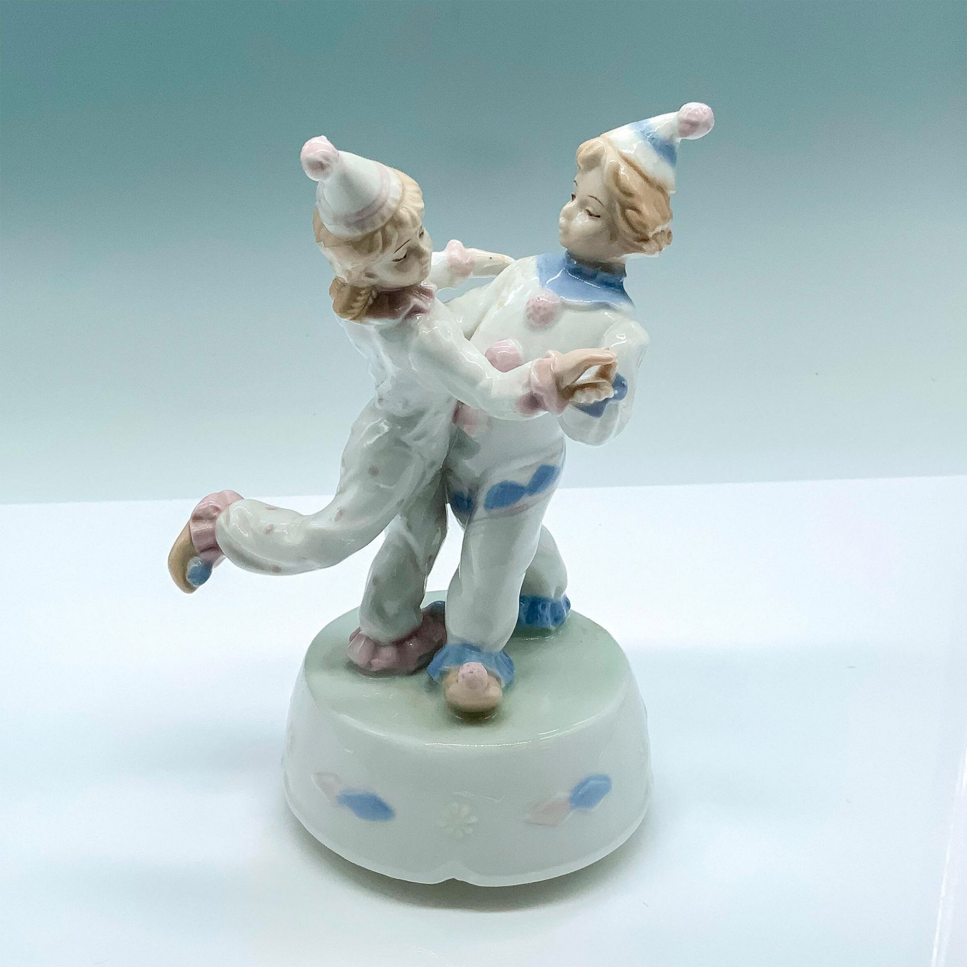 Meico Porcelain Dancing Clowns Music Box