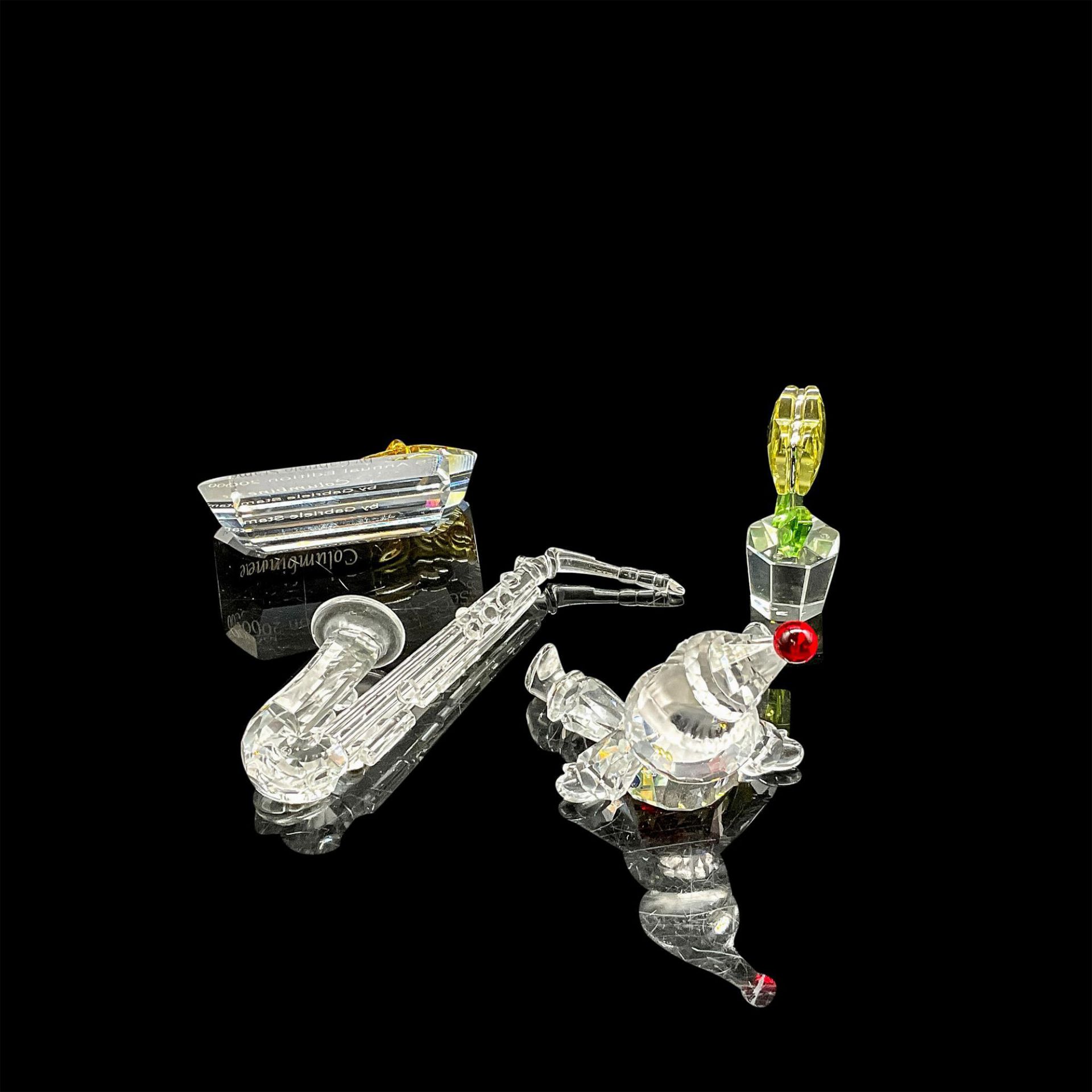 4pc Swarovski Crystal Grouping, Clown, Sax, Flower, Plaque - Image 2 of 3