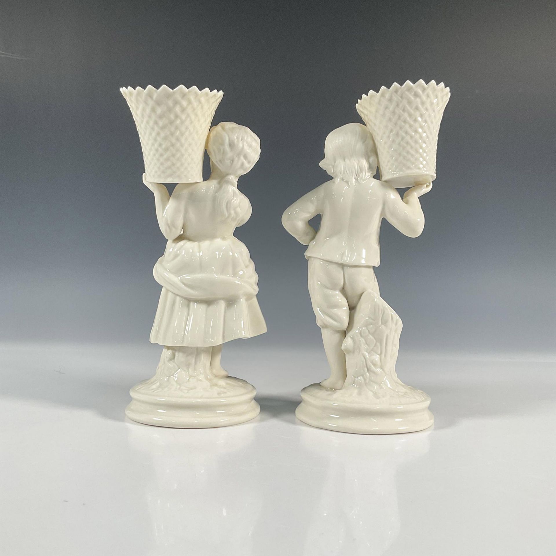 Pair of Belleek Porcelain Candleholders, Boy and Girl Basket - Image 2 of 3