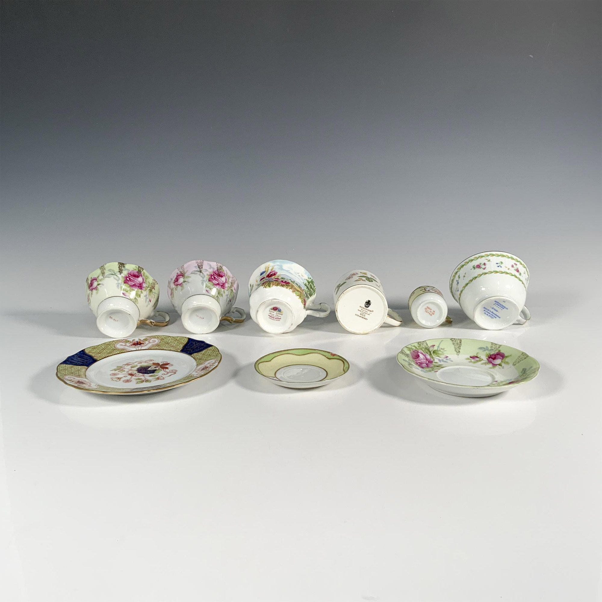 9pc Porcelain Floral Motif Teacups, Saucers, and Demitasse - Image 3 of 3