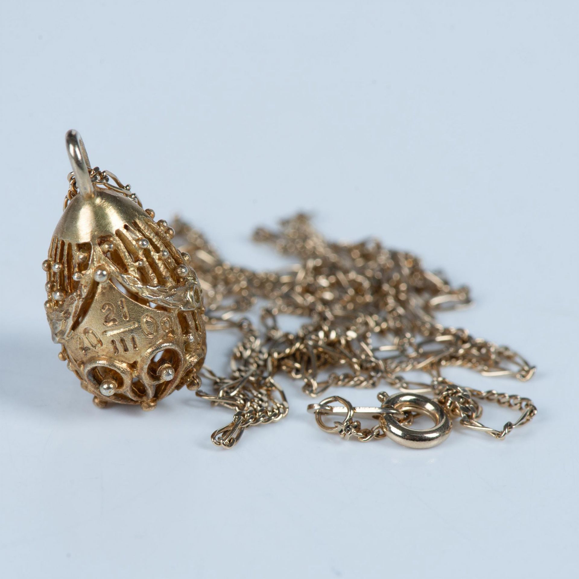 Mini Ornate Gold Metal Egg Pendant Necklace - Image 3 of 4