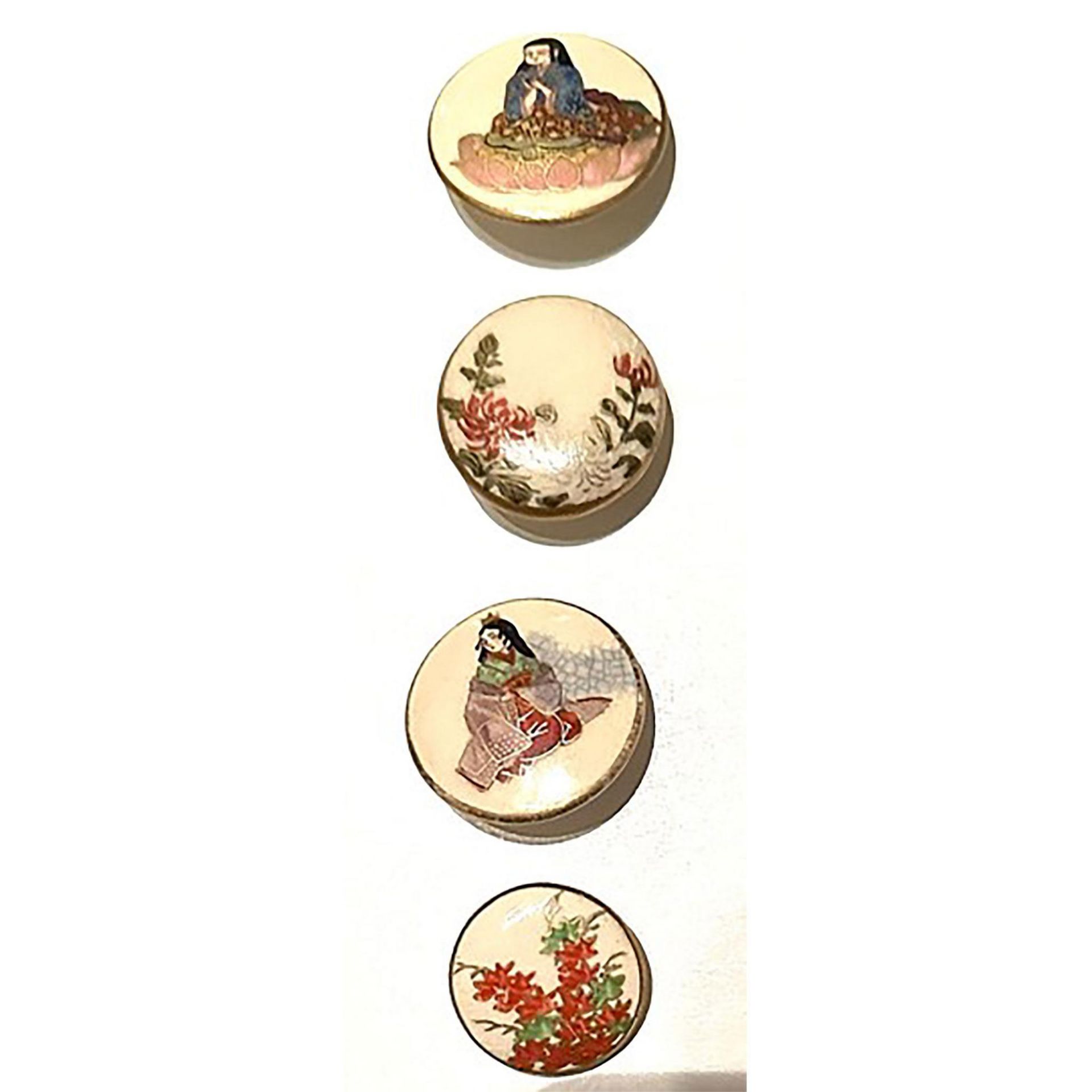 A small card of division three Satsuma buttons