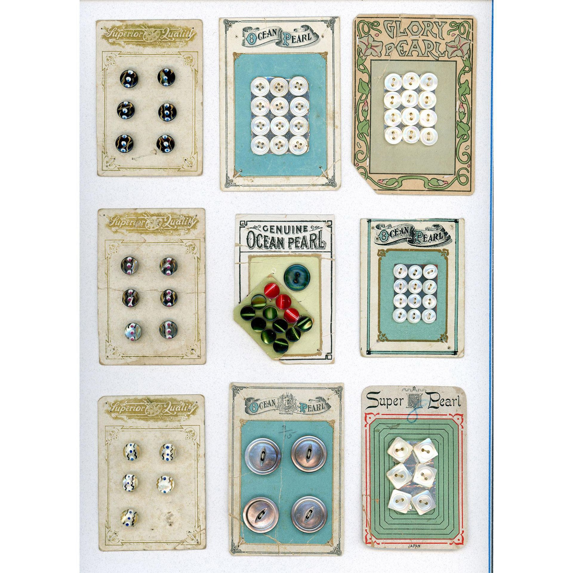 A box lot of assorted material buttons on cards - Image 9 of 11