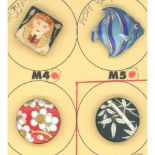 A small card of division three Japanese porcelain buttons