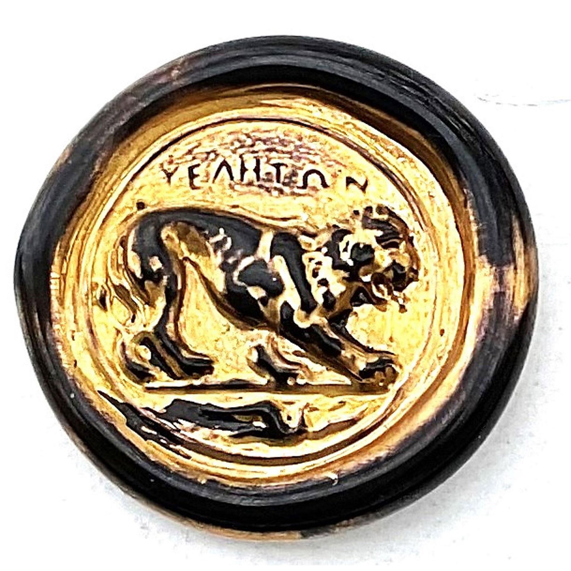 A division 3 backmarked Glass button from England