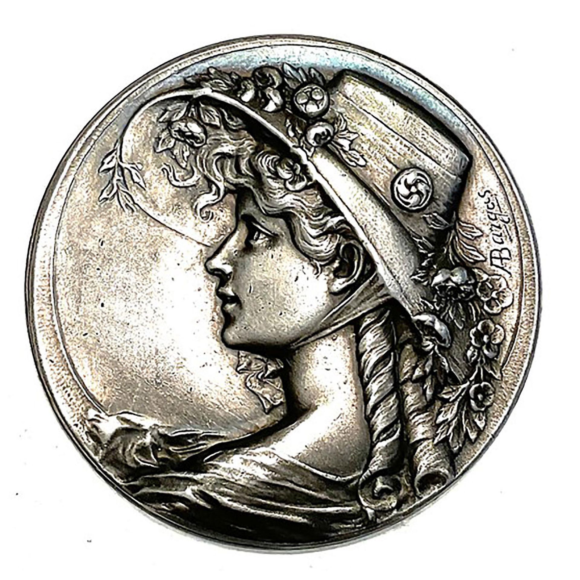 A division one relief Art Nouveau Lady button