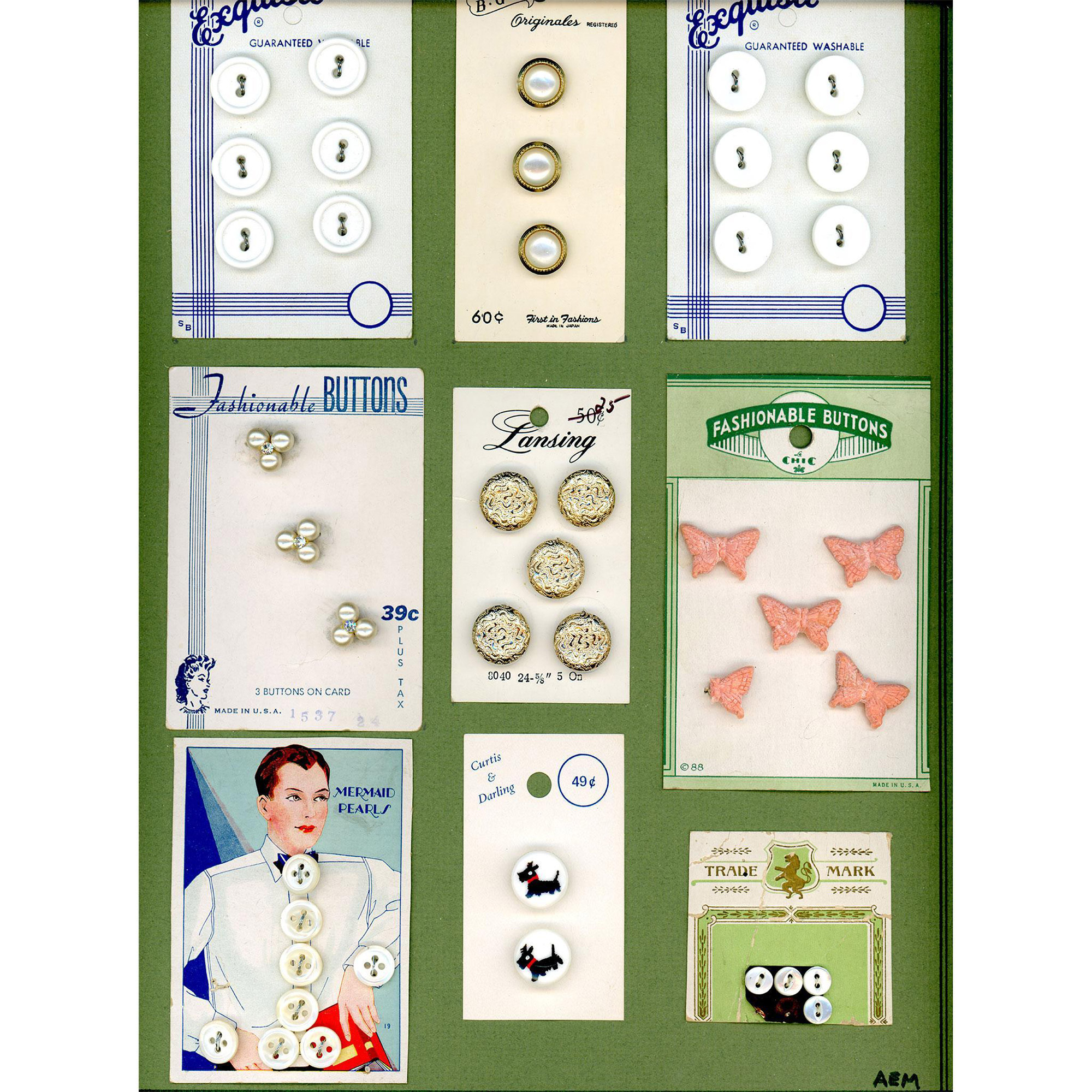 A box lot of assorted material buttons on cards - Image 8 of 11