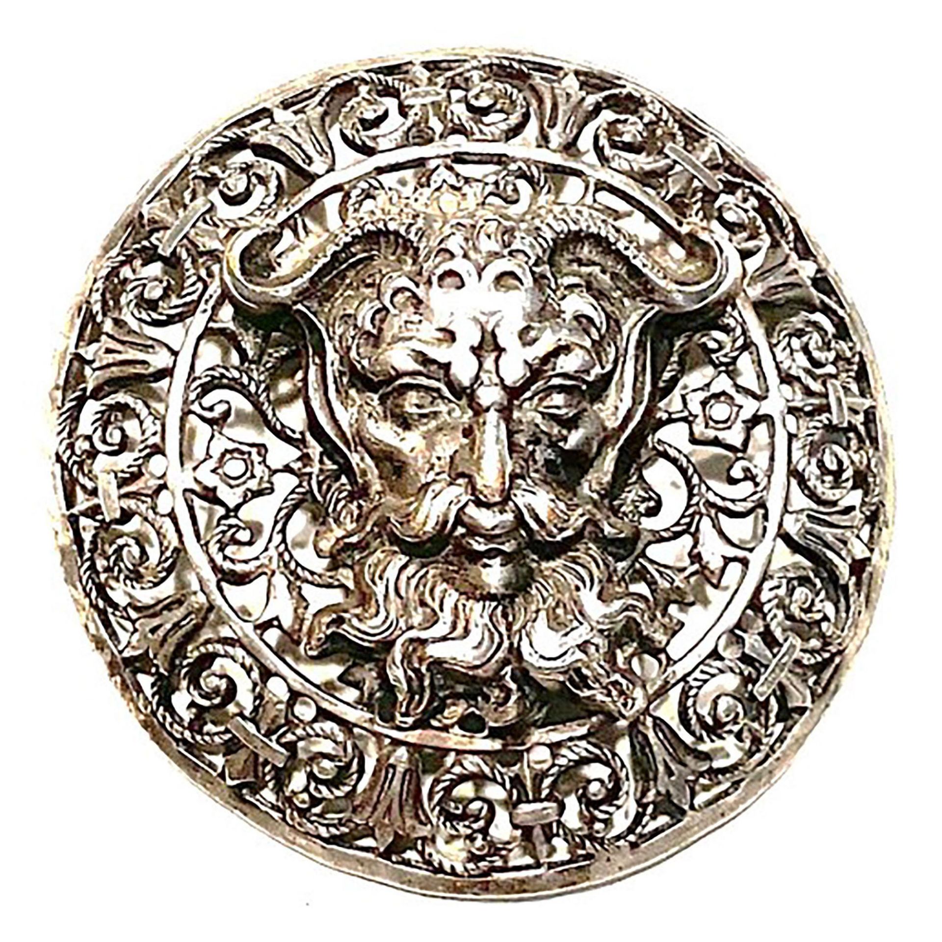 A division one filigree style Green Man button