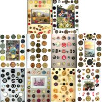 A box lot of assorted material buttons on cards