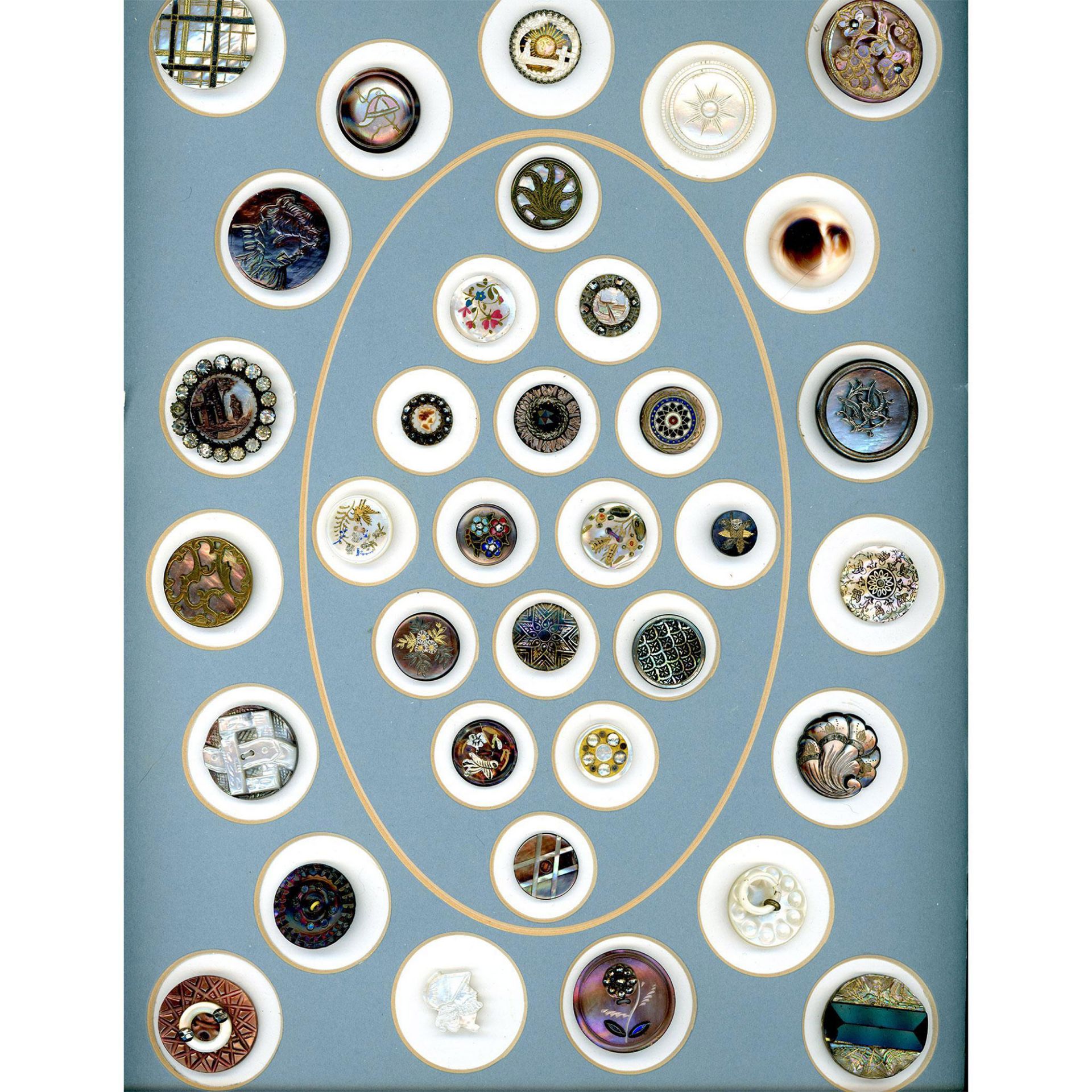 A card of division one carved pearl buttons