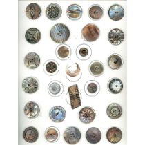 A card of assorted shaded mother of pearl buttons