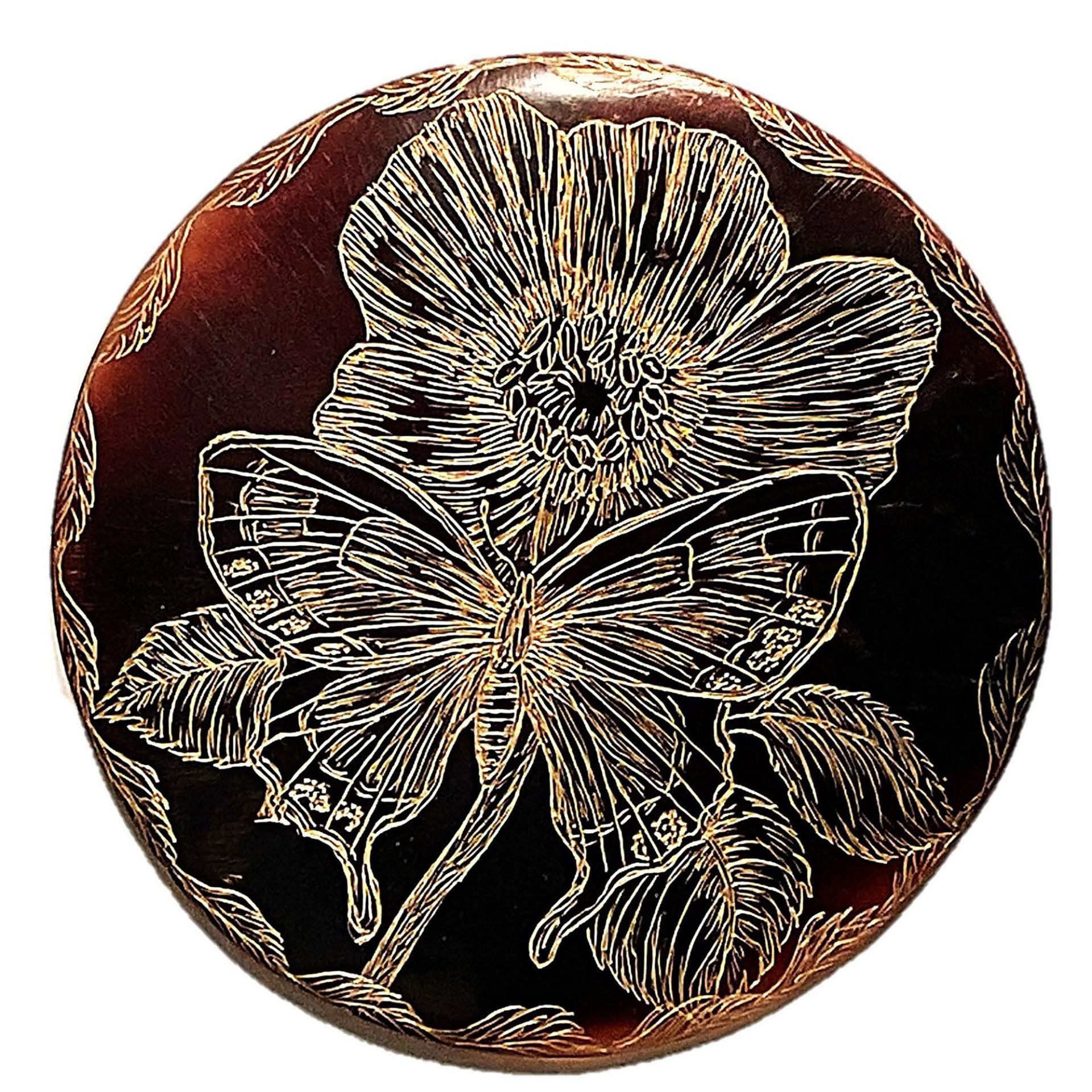 A division three studio artist Butterfly button.