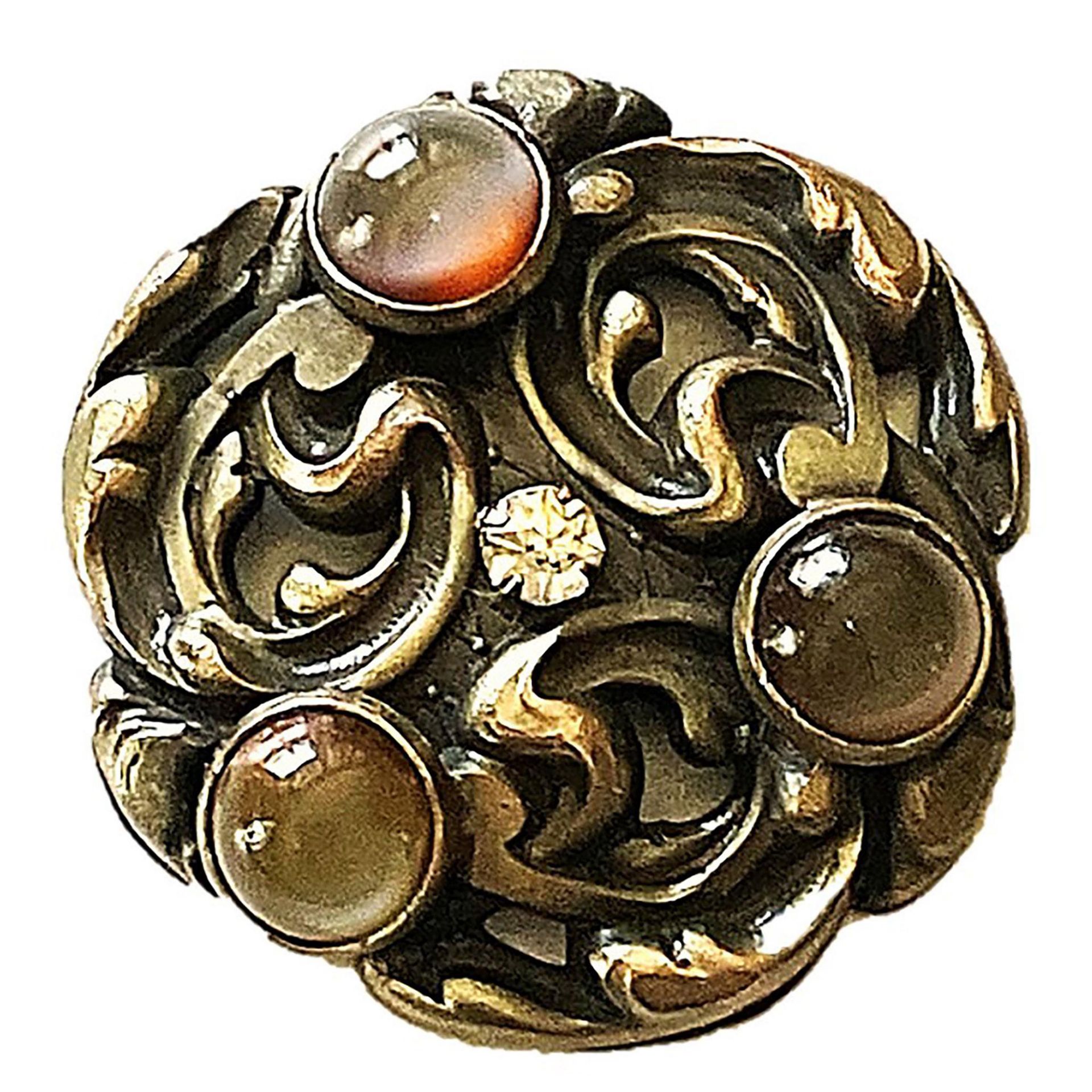 A division one pierced jeweled button