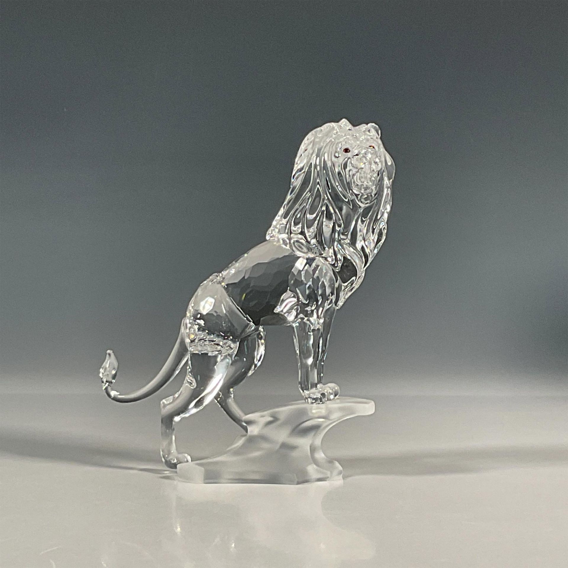 Swarovski Crystal Figurine, Lion Standing on Rock