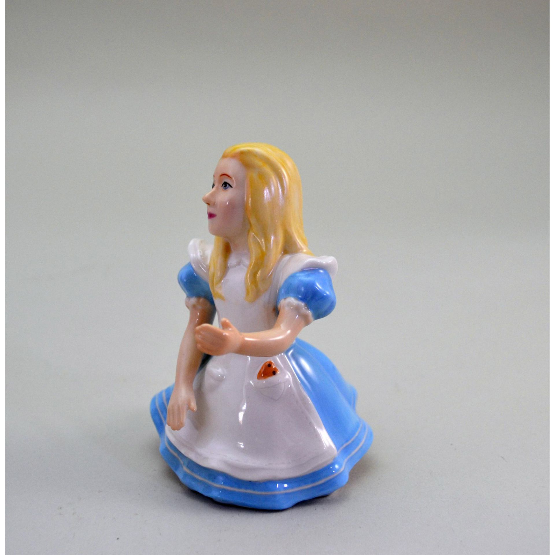Dept 56 Alice Of Alice In Wonderland Porcelain Candle Snuffer - Image 4 of 5