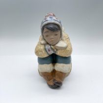Lladro Porcelain Figurine, Pensive Eskimo Boy 1012159