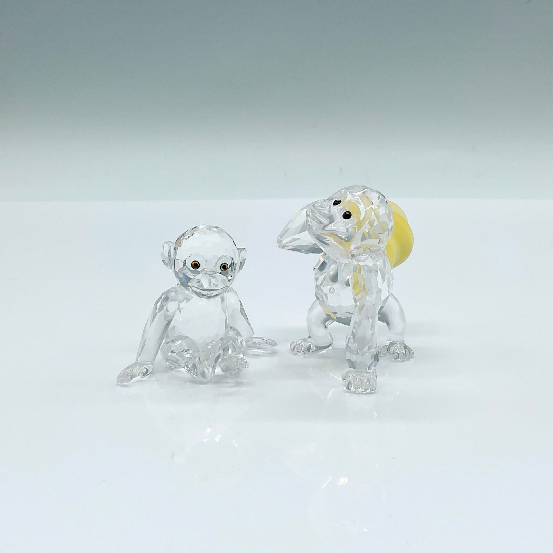 2pc Swarovski Crystal Figurines, Chimpanzee & Gorilla Young