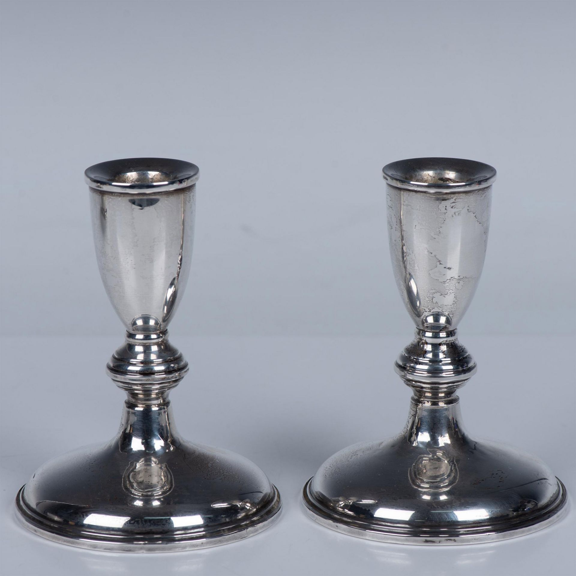 Pair of Cartier Weighted Sterling Candlestick Holders