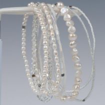 8pc Beautiful Set of White Baroque Pearl and Bead Bracelets