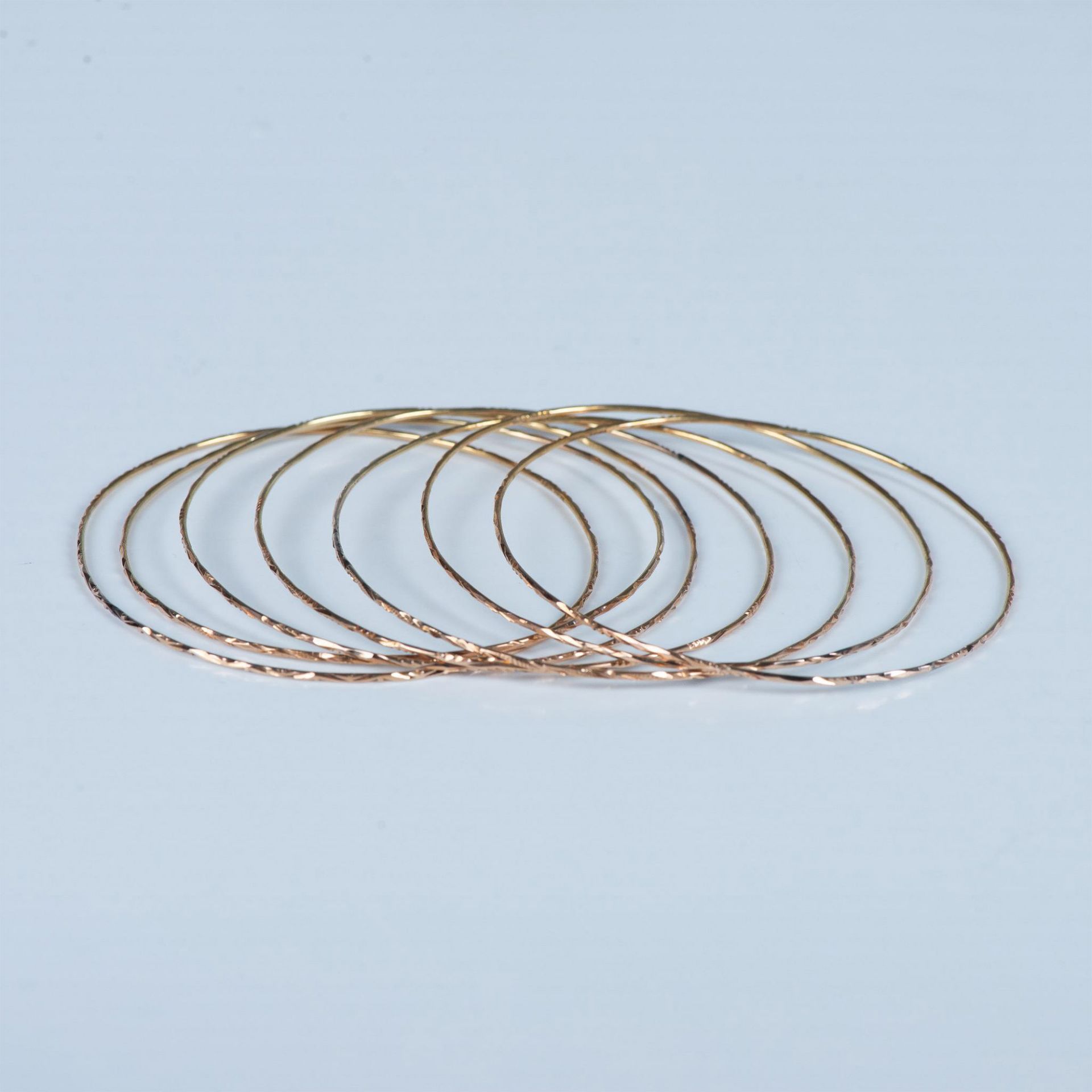 7pc Set of Fine 14K Gold Bangle Bracelets - Image 3 of 5
