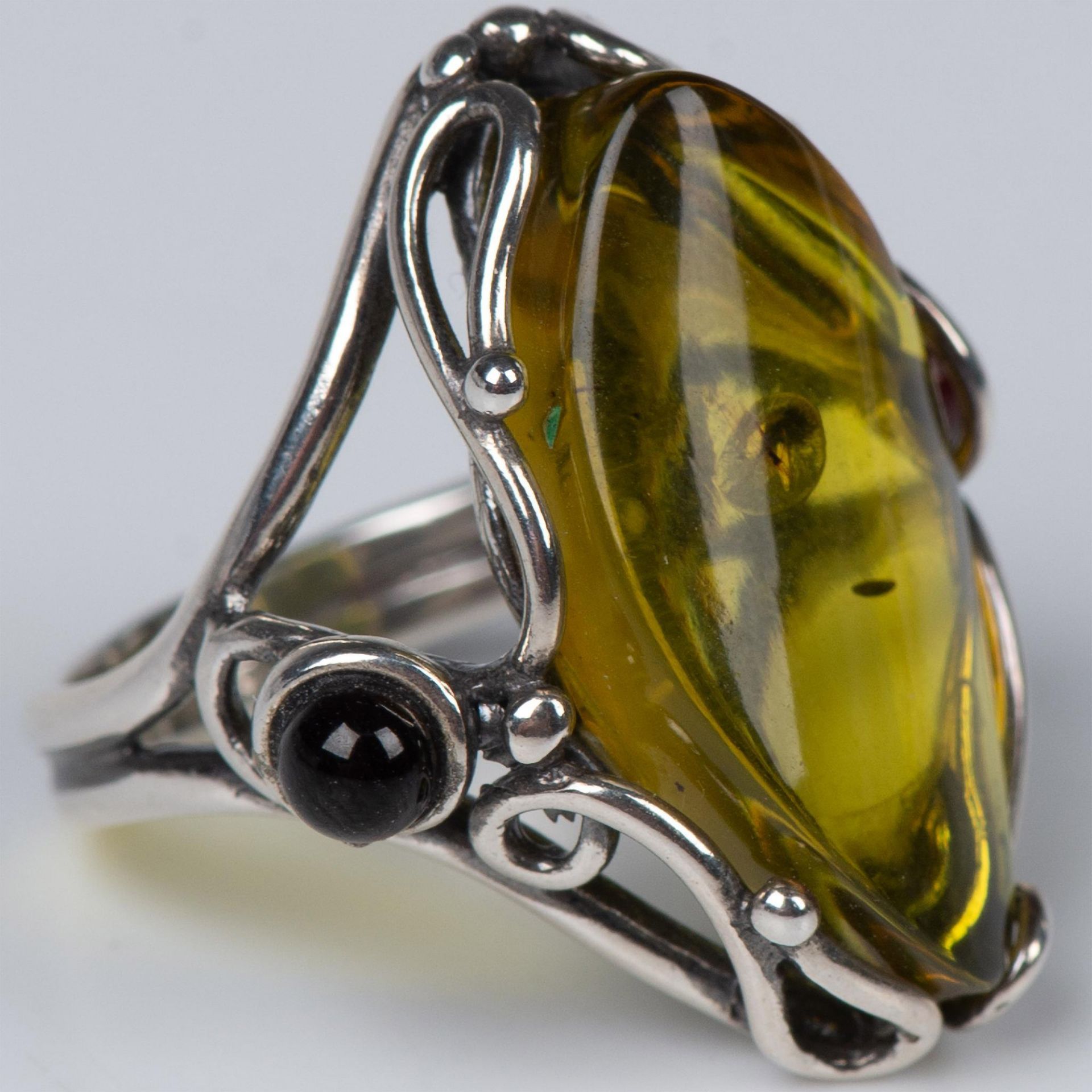 Artistic Sterling Silver and Amber Ring