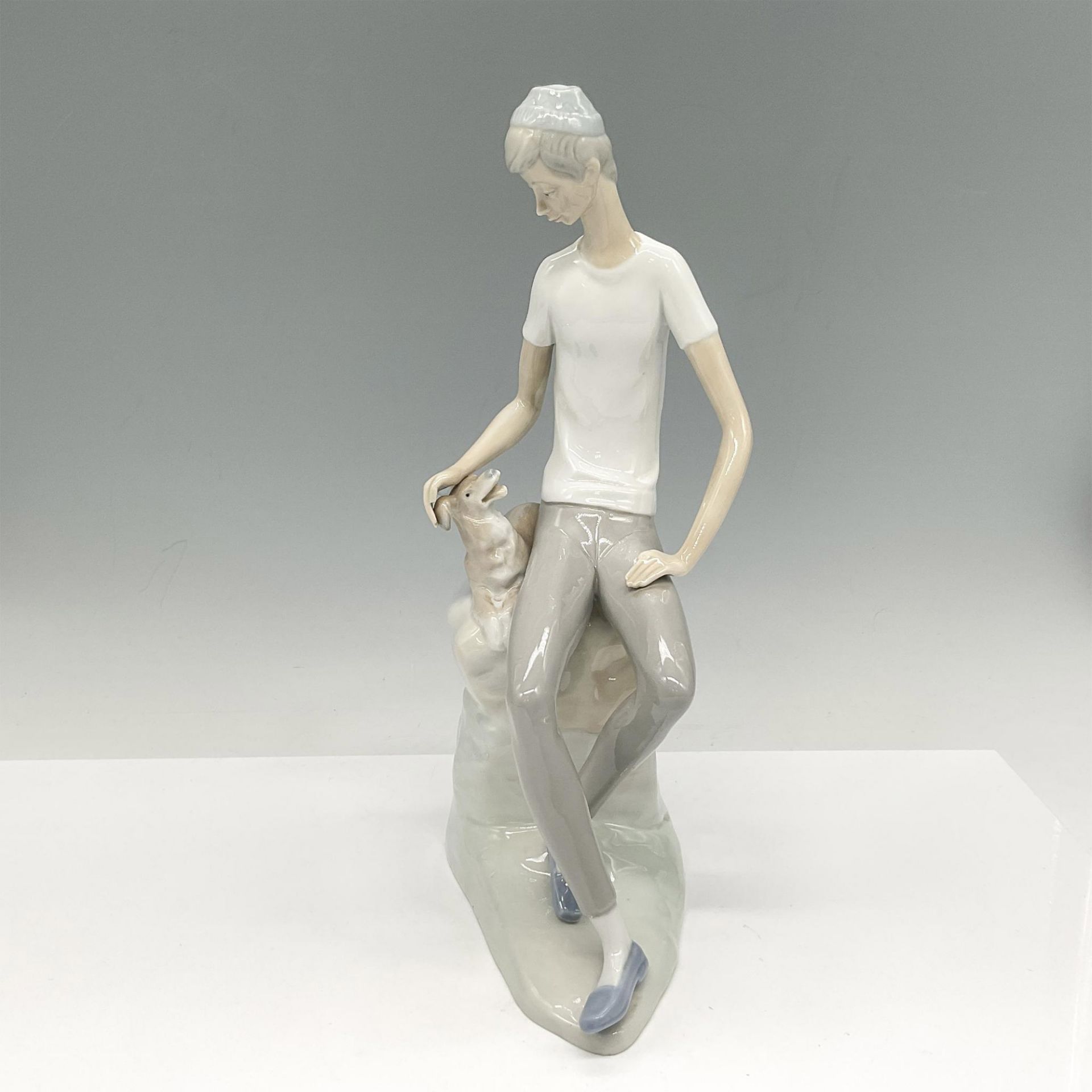 Boy with Dog - Nao by Lladro Porcelain Figurine