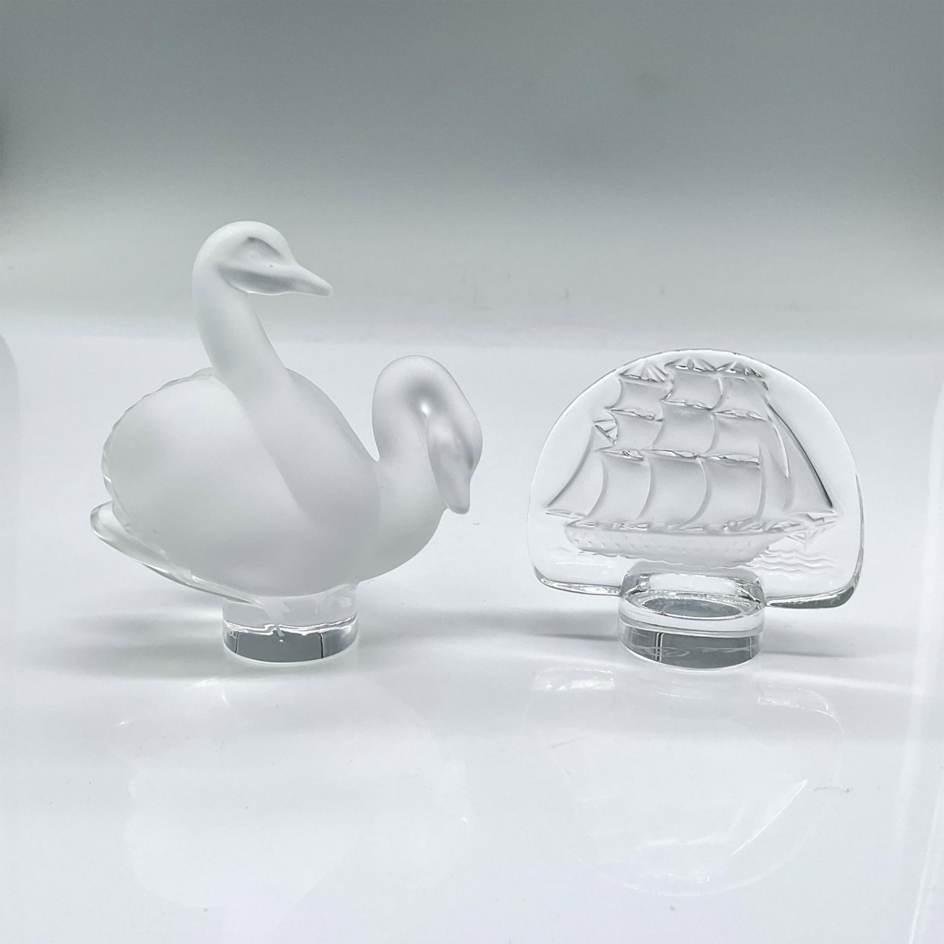 2pc Lalique Crystal Paperweights, Caravelle Ship and Swans